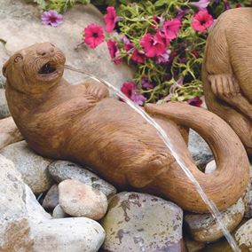 Lying Otter Plumbed Cast Stone Pond Spitter